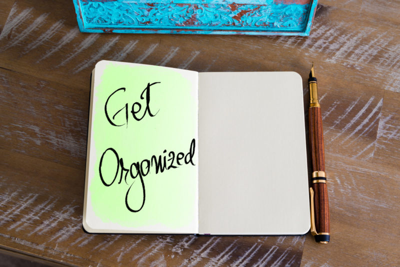 Office Organization Tips: Reminder to get organized in a notebook.